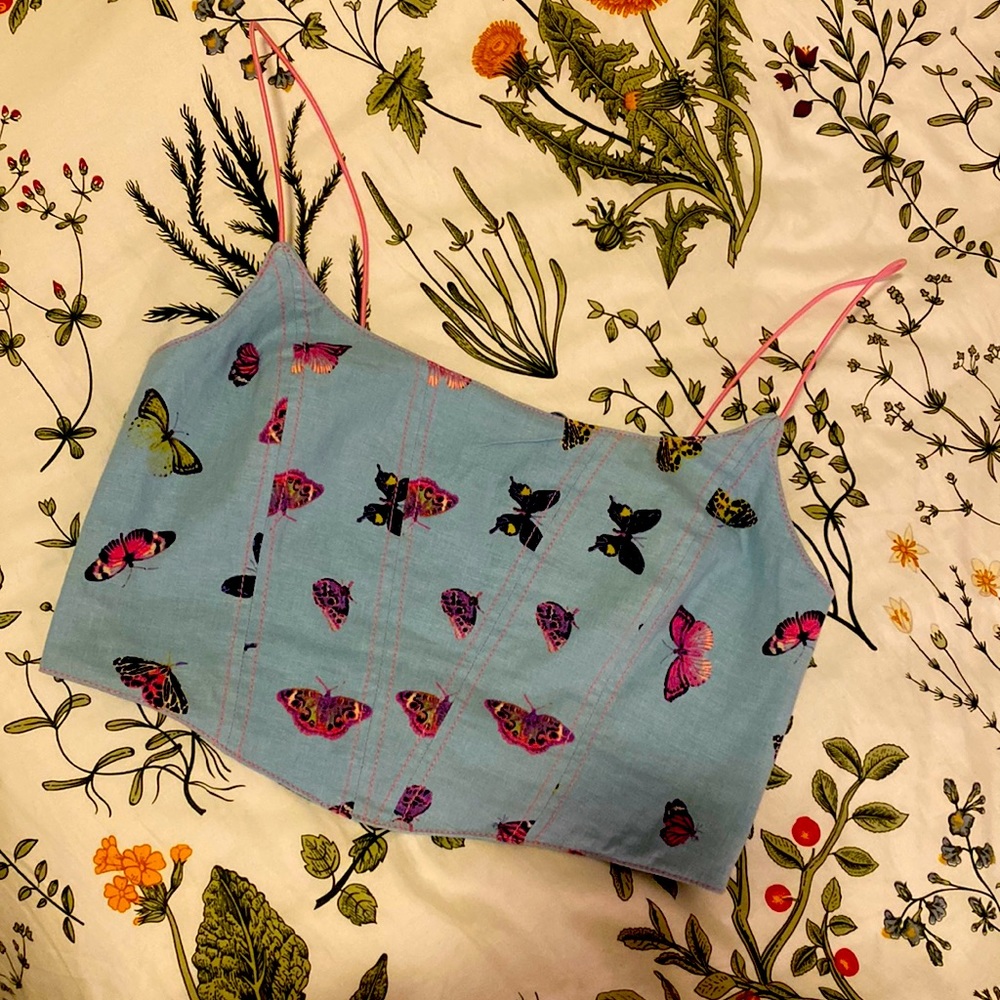 Urban Outfitters cropped, corset top. Size Medium. Zips in back.